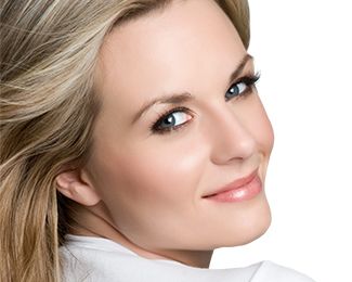 Smiling woman with smooth, youthful skin